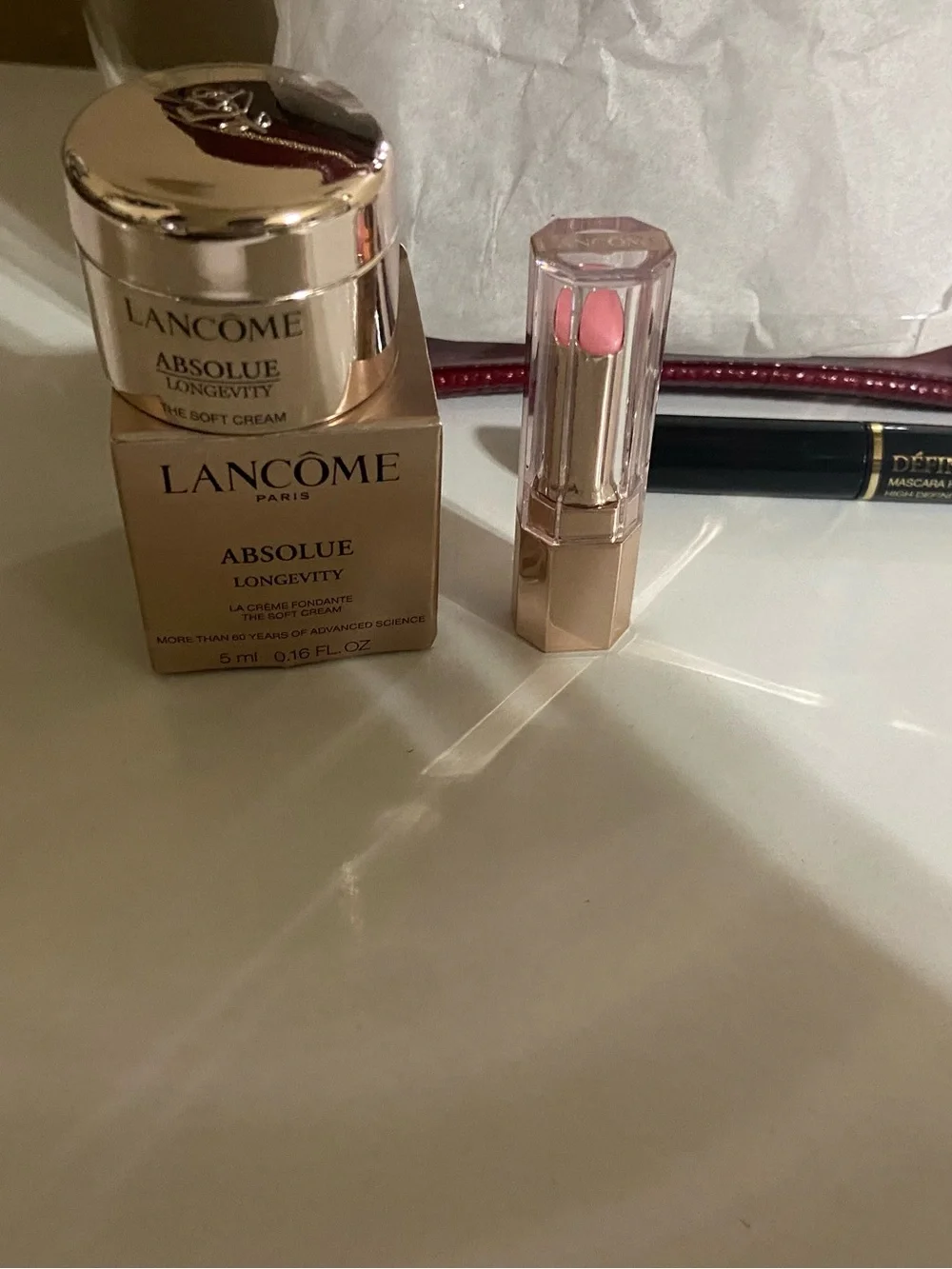 Jimmy Choo Sunglasses and Red Clear Lancome Cosmetic Travel makeup case